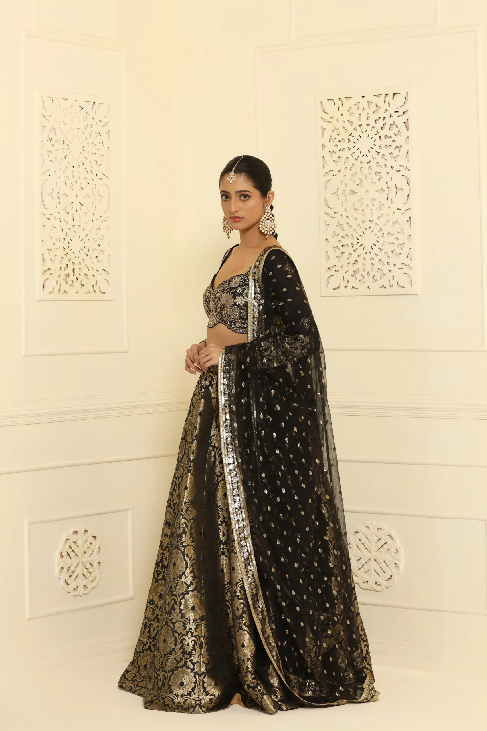 Handcrafted nakshi, sequin, and dabka choli paired with a Banarasi brocade lehenga. - Image 2