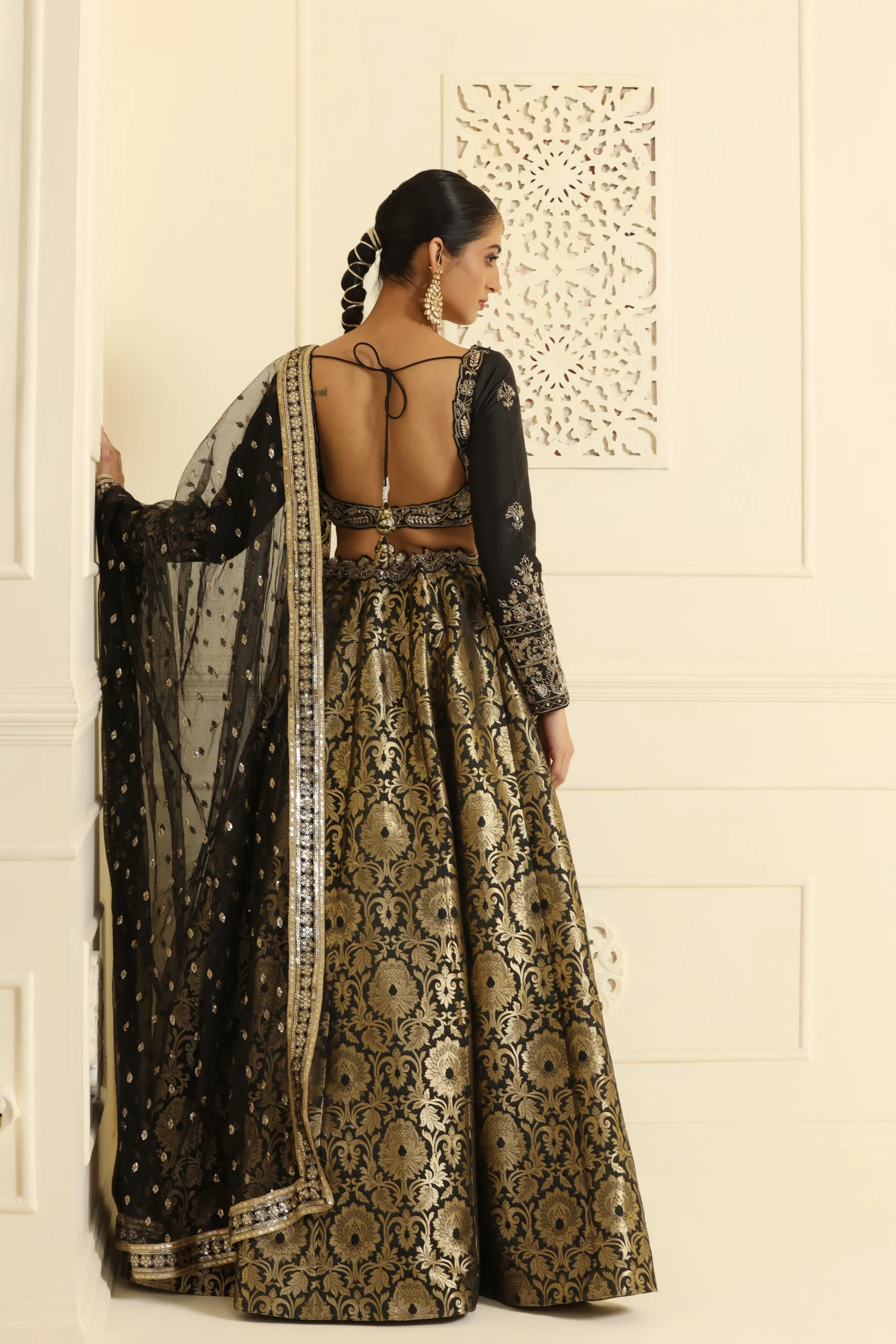 Handcrafted nakshi, sequin, and dabka choli paired with a Banarasi brocade lehenga. - Image 3